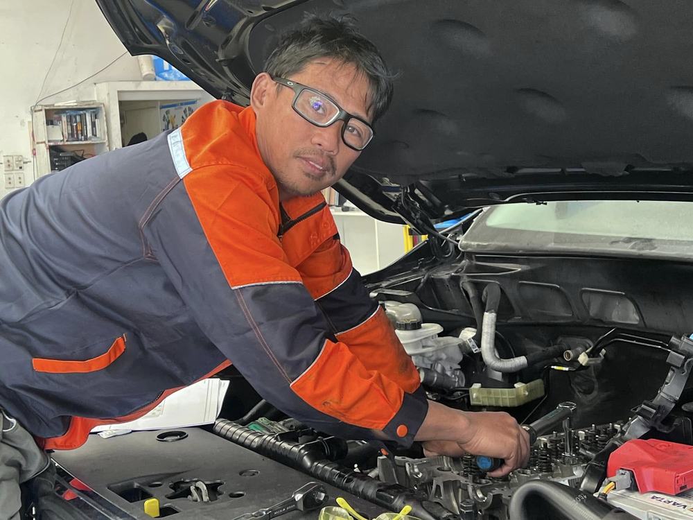 Automotive technician carrying out car servicing in New Plymouth