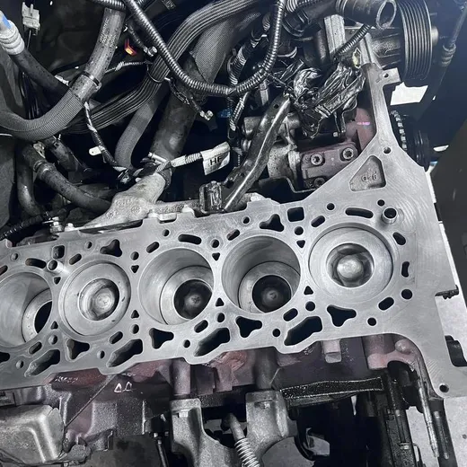 Engine block and cylinders being inspected in the workshop